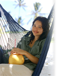 Pretty girl
				enjoying the goodness of Coconuts